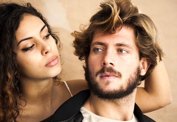 Portrait of a loving couple and She’s pulling his hair.